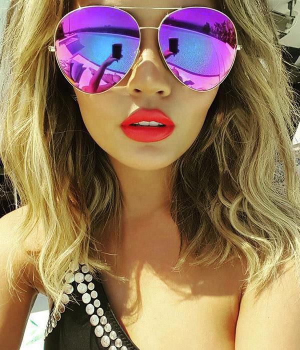 Chrissy Teigen in Victoria Beckham - sunglasscurator
